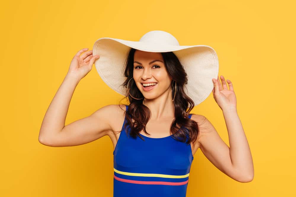 woman wearing summer hat