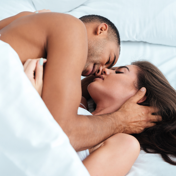 Intimate couples in bed